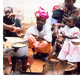 Family in Gambi cooking